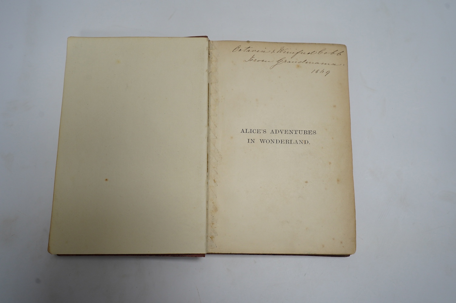 [Dodgson, Charles Lutwidge] - Alice's Adventures in Wonderland. By Lewis Carroll ... sixteenth thousand. frontis. and 41 engraved text illus. (by John Tenniel), half title; original gilt ruled and pictorial red cloth, so